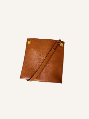Valentino Garavani Logo Debossed Messenger Bag