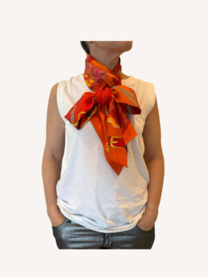 Hermès Amazon Festival scarf styled as a neck accessory