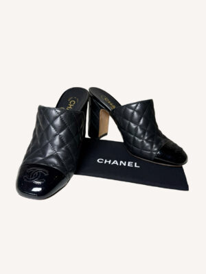 Chanel black quilted leather mules with patent cap toe and CC logo