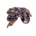 Luxurious Cartier silk scarf featuring an intricate paisley pattern design