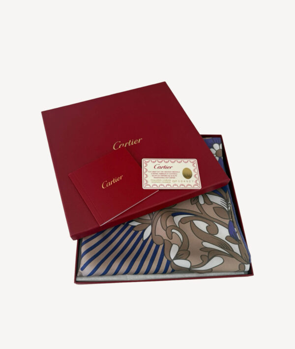 Elegant Cartier Must De Cartier scarf featuring a black panther motif with colorful floral accents, crafted from silk
