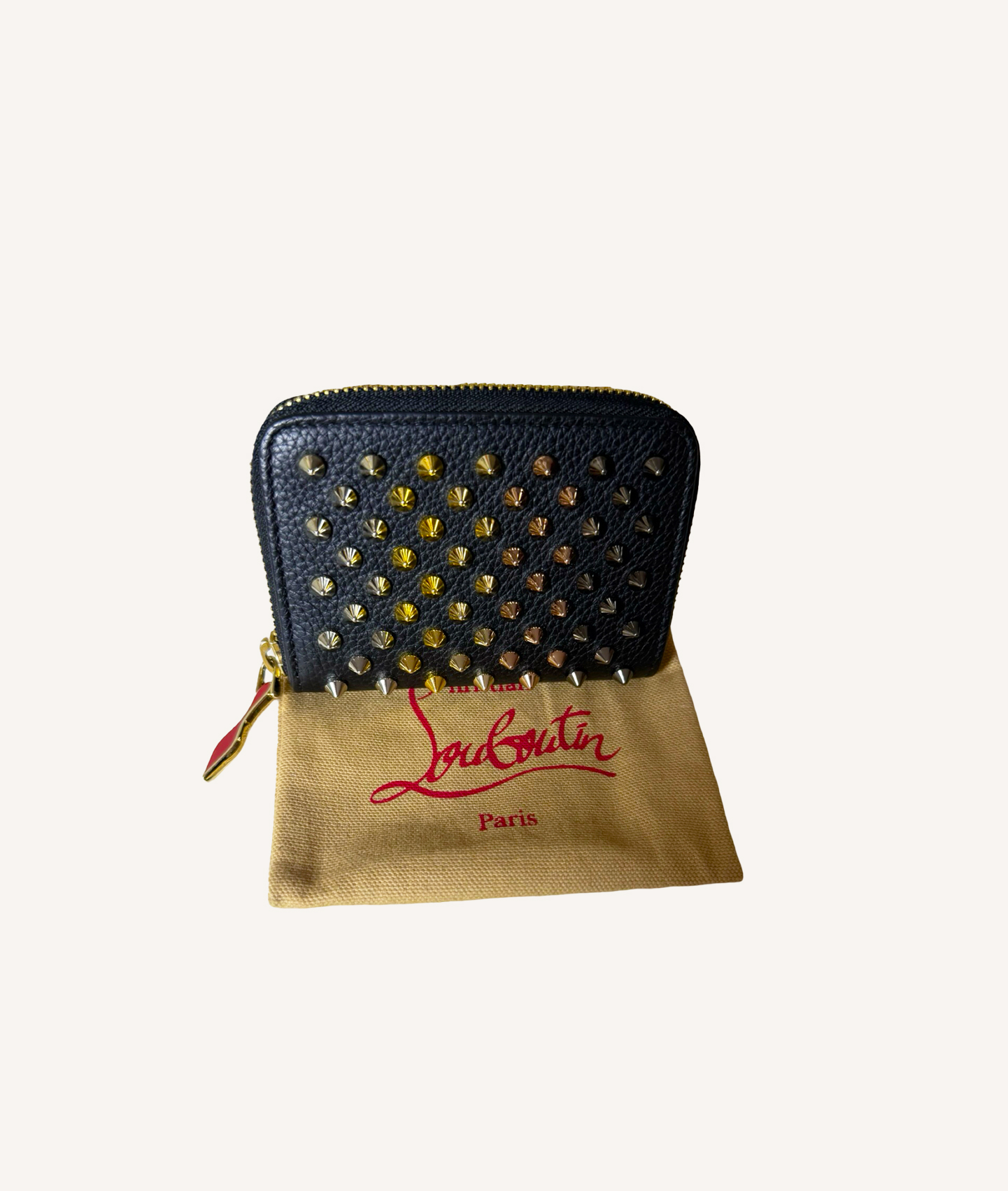 Christian Louboutin spike leather wallet with signature red interior