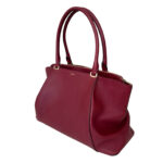 C De Cartier bag crafted from luxurious spinel bull calfskin in deep burgundy shade