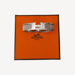 Hermès Clic H bracelet in taupe enamel with palladium-plated hardware, iconic hinged bangle