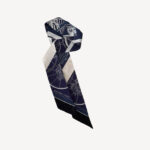 Hermès Twilly Spring Springs silk scarf with whimsical horse motif in narrow design, luxury French accessory