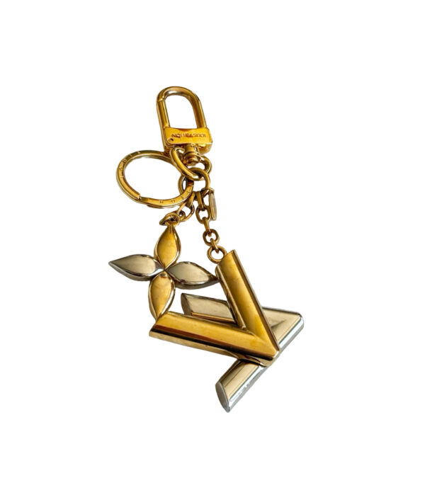 Designer Louis Vuitton gold and silver-tone bag charm and key ring