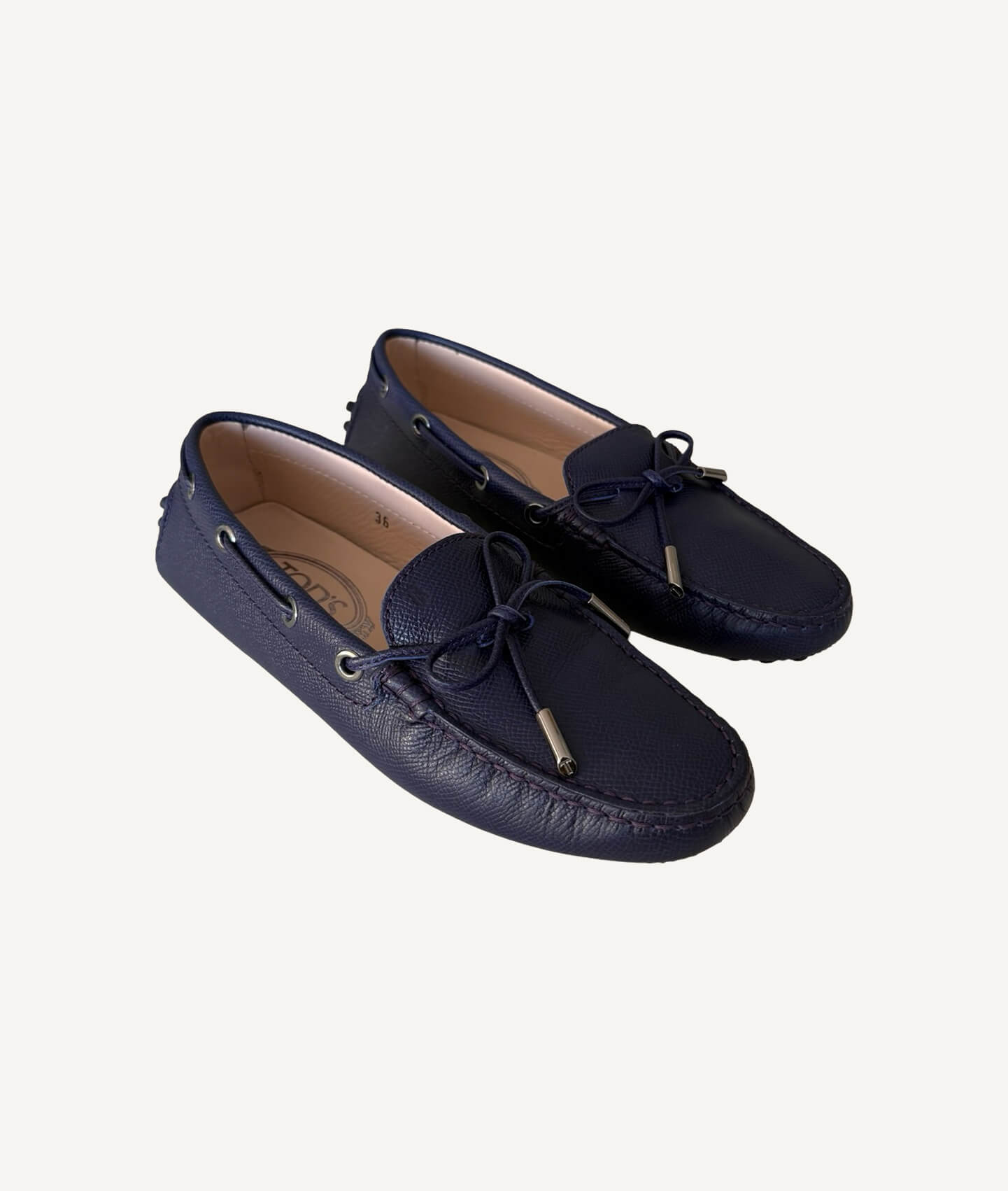 Navy Tod’s Gommino driving shoes in premium leather with rubber pebble sole