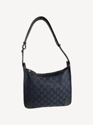 Gucci black GG canvas and leather shoulder bag with leather strap and zip closure