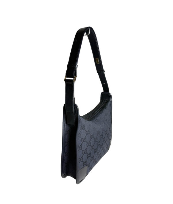 Gucci shoulder bag in black GG canvas with leather corners and silver hardware