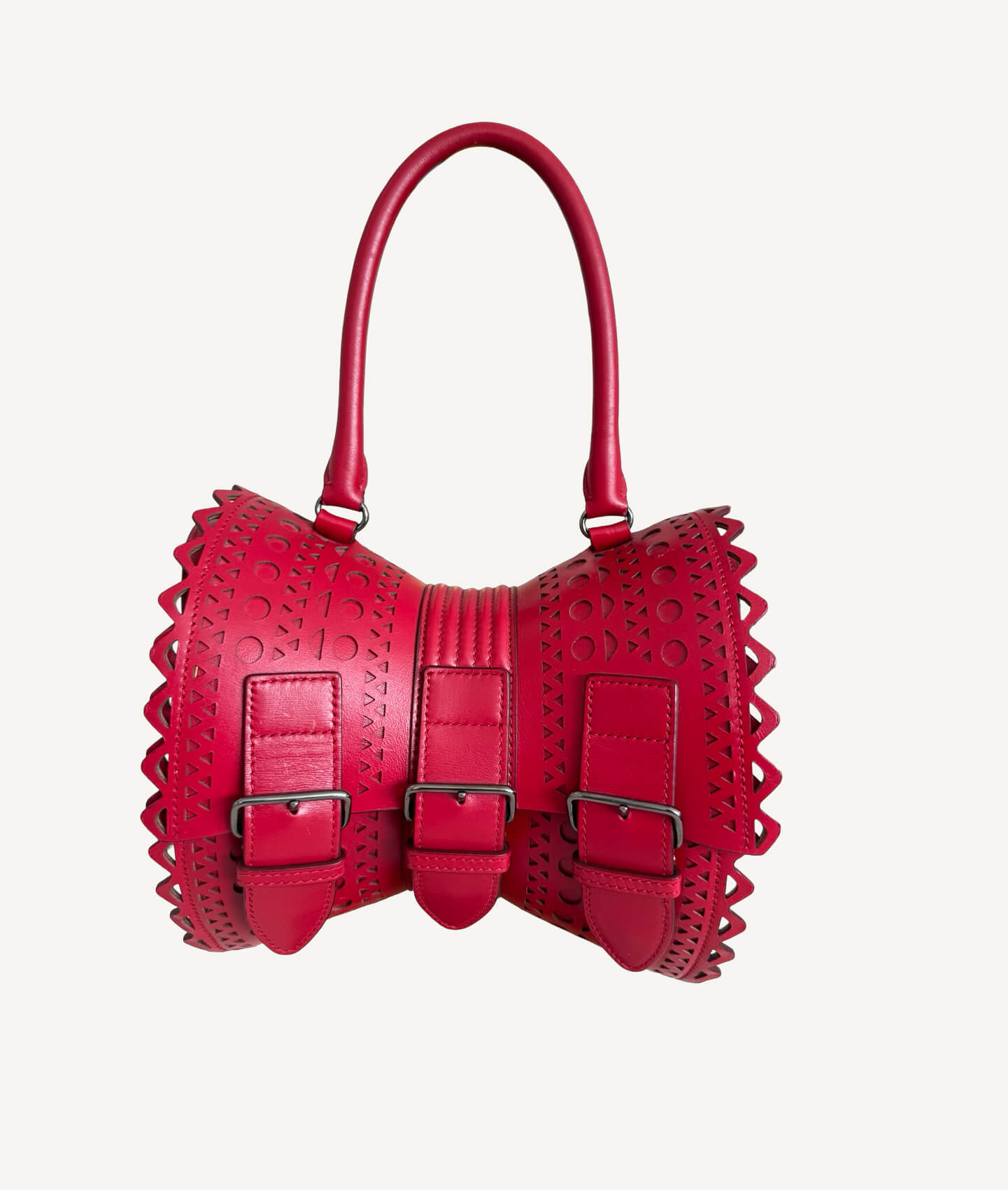 Alaïa Vienne 1992 corset leather top handle bag in red with laser cut detailing