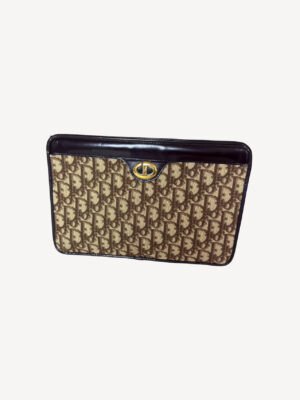 Vintage Christian Dior Trotter clutch in beige monogram canvas with brown leather trim and gold CD clasp.